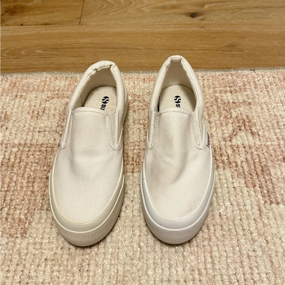 Women’s white canvas like new size 6 Superga Platform slip on sneakers.